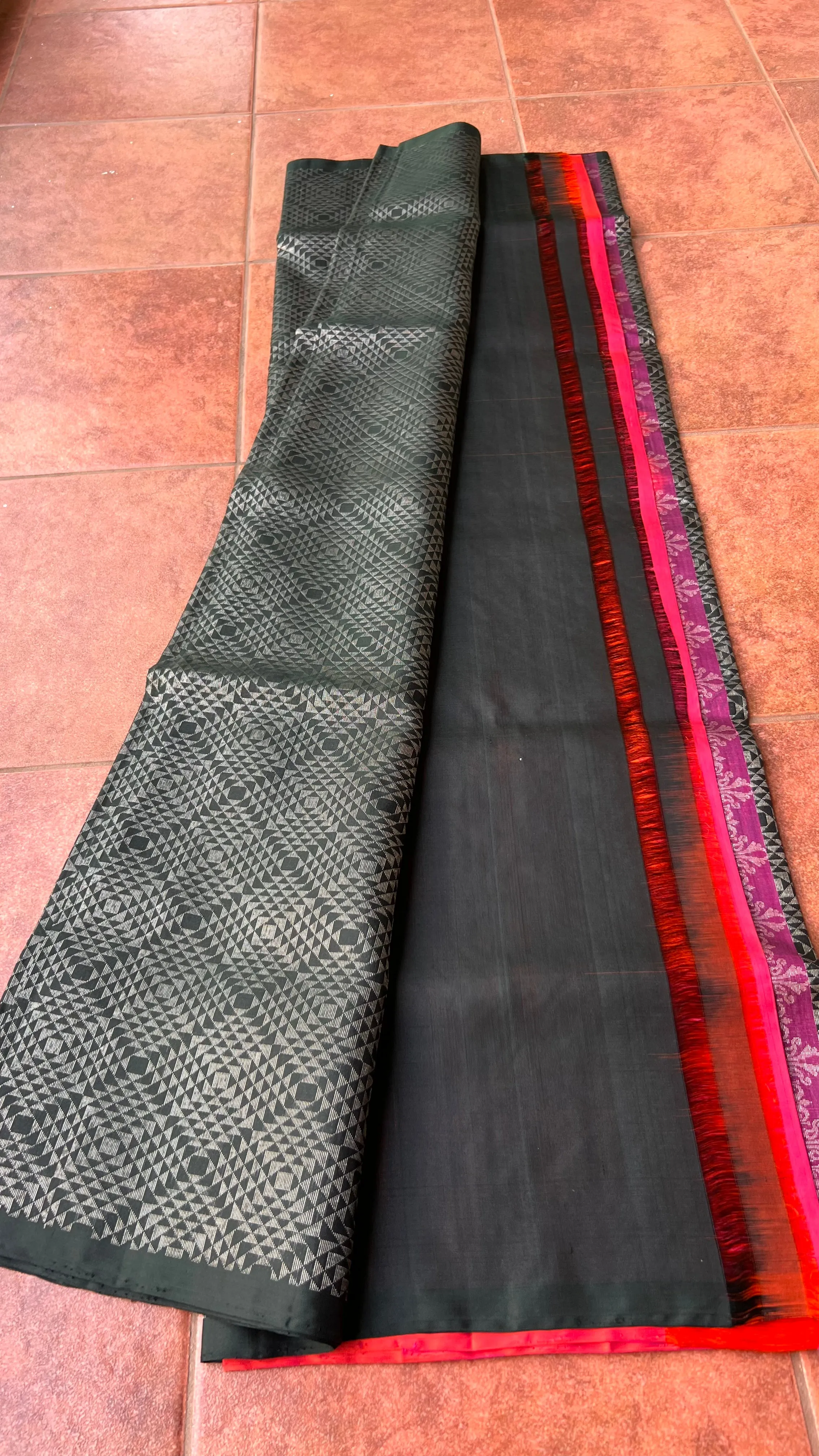 Black and orange matrix kanchipuram silk saree with blouse