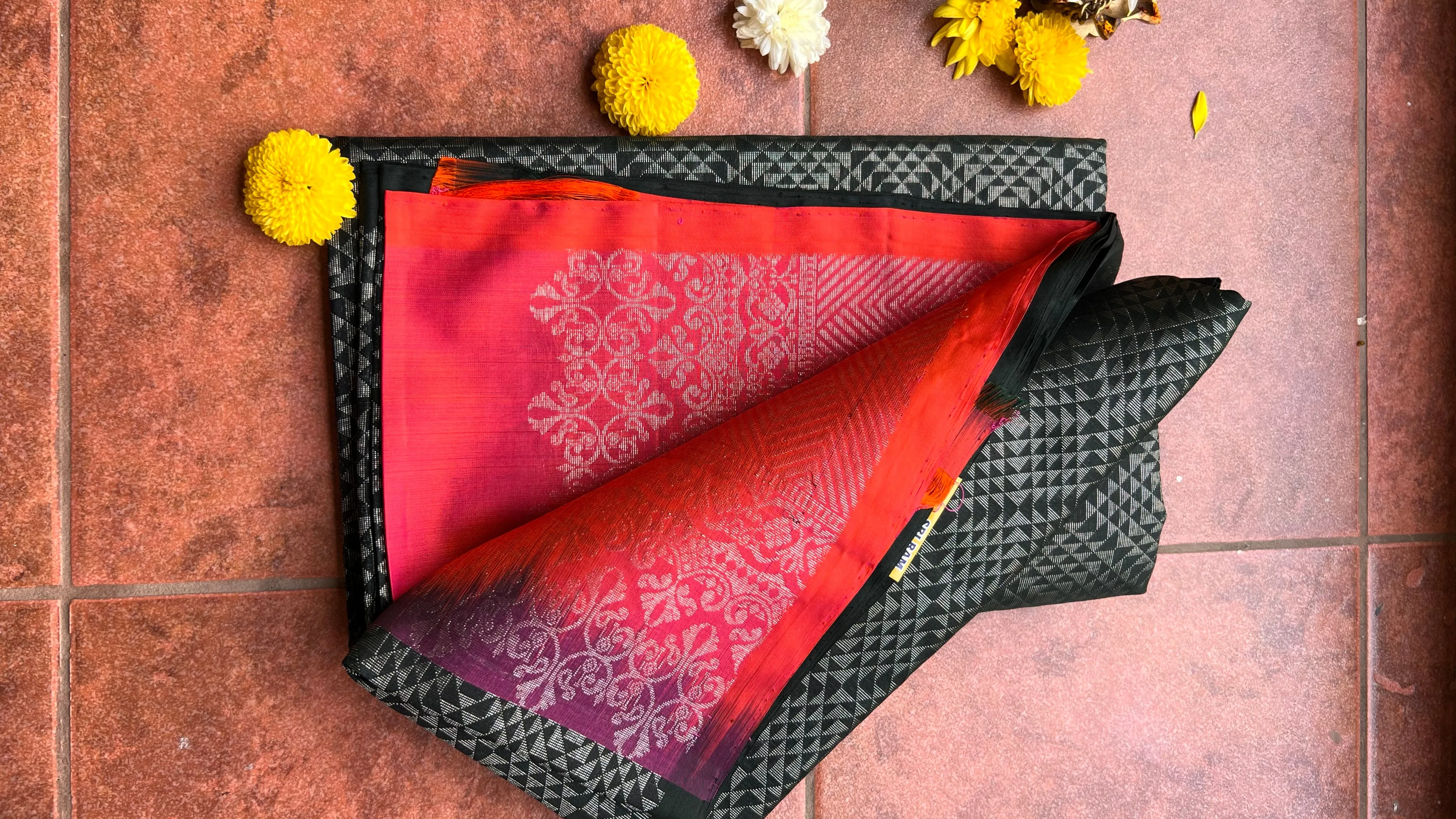 Black and orange matrix kanchipuram silk saree with blouse