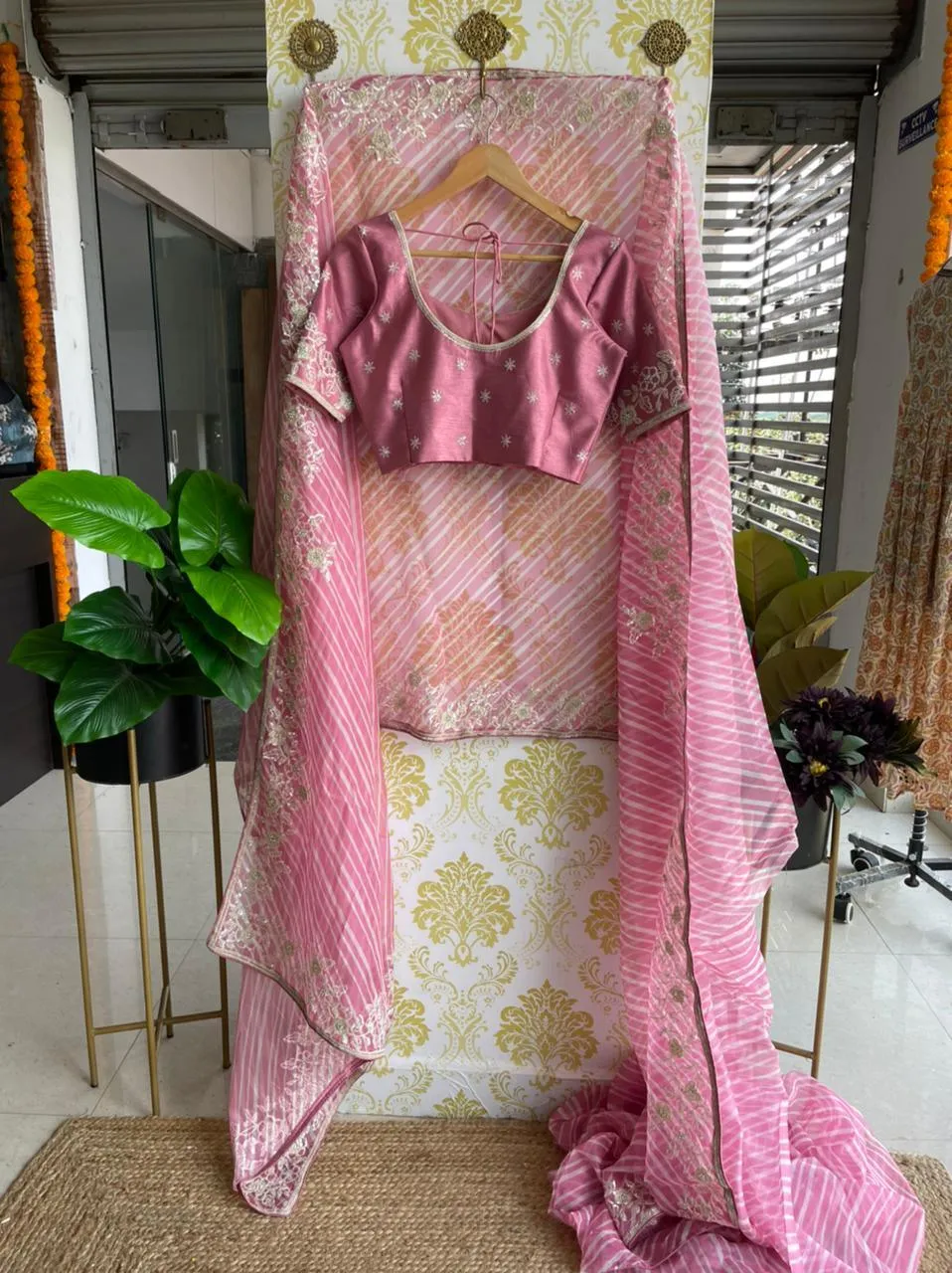 Lehariya pink organza saree with blue hand worked blouse