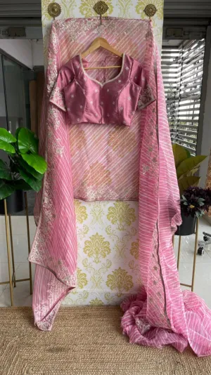 Lehariya pink organza saree with blue hand worked blouse