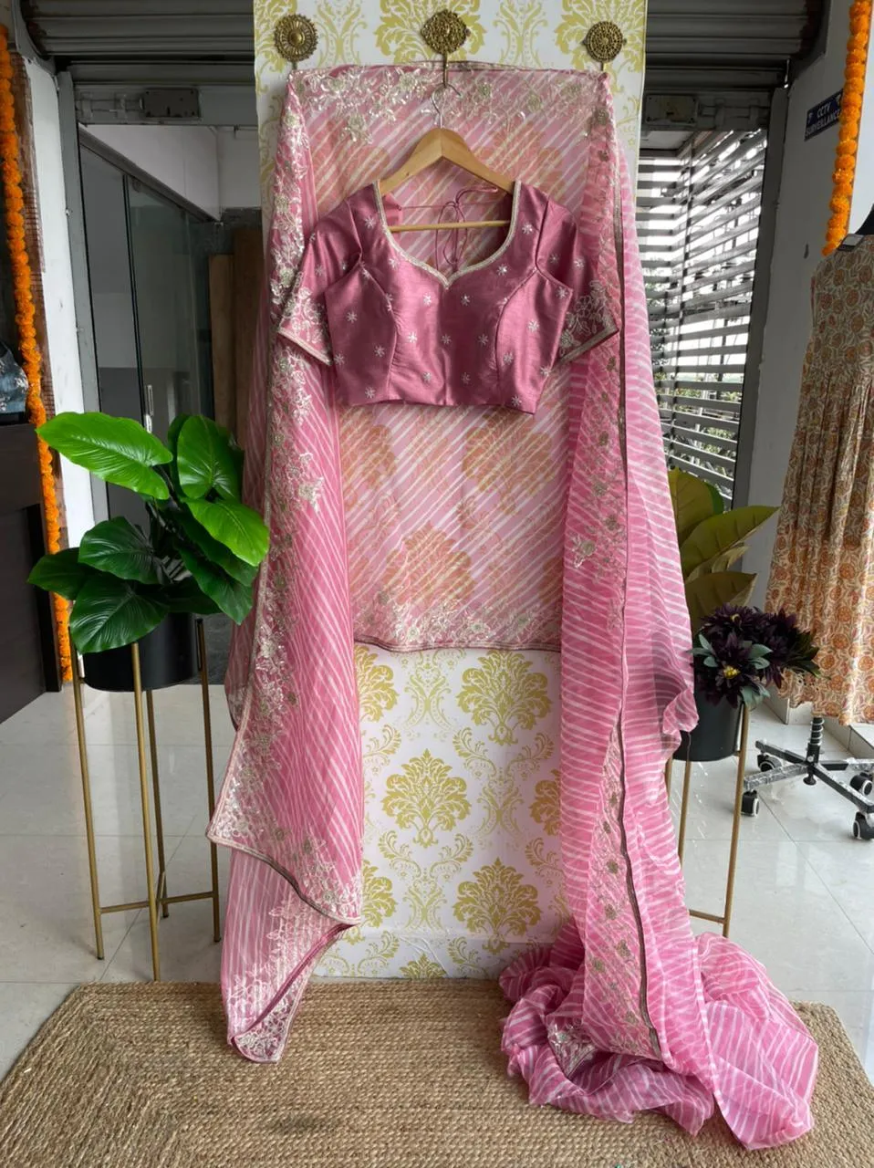 Lehariya pink organza saree with blue hand worked blouse