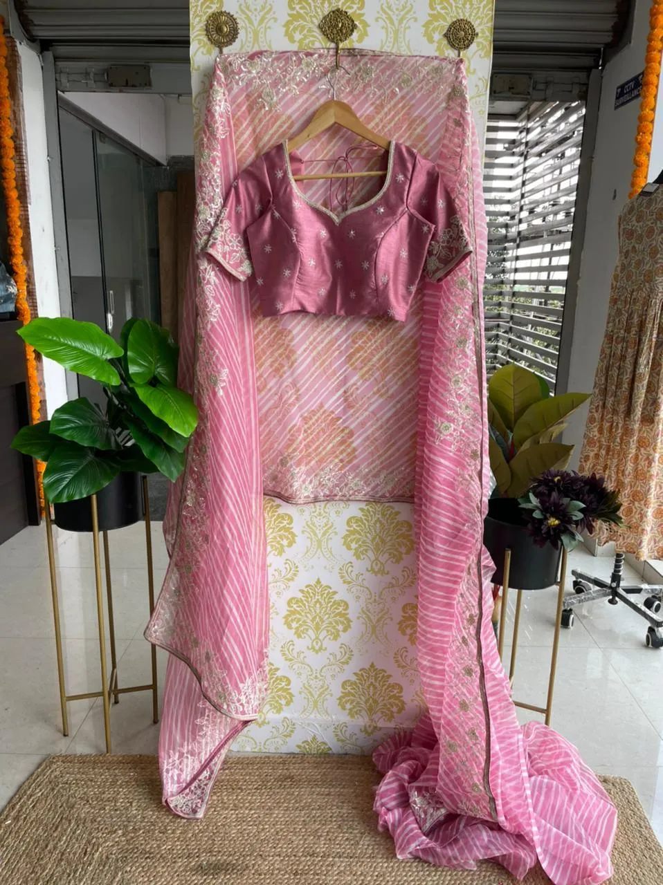 Lehariya pink organza saree with blue hand worked blouse