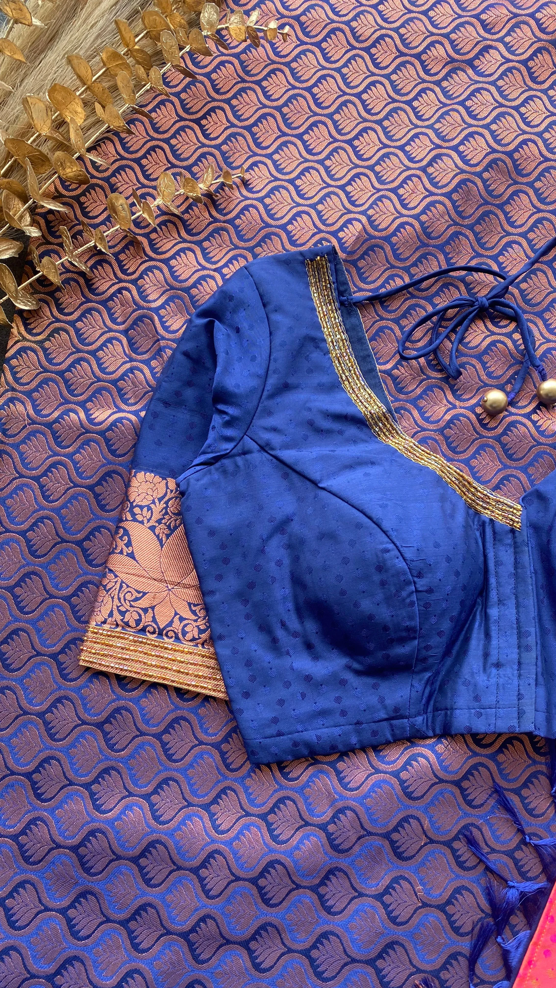 Peach and navy blue silk saree with hand work blouse