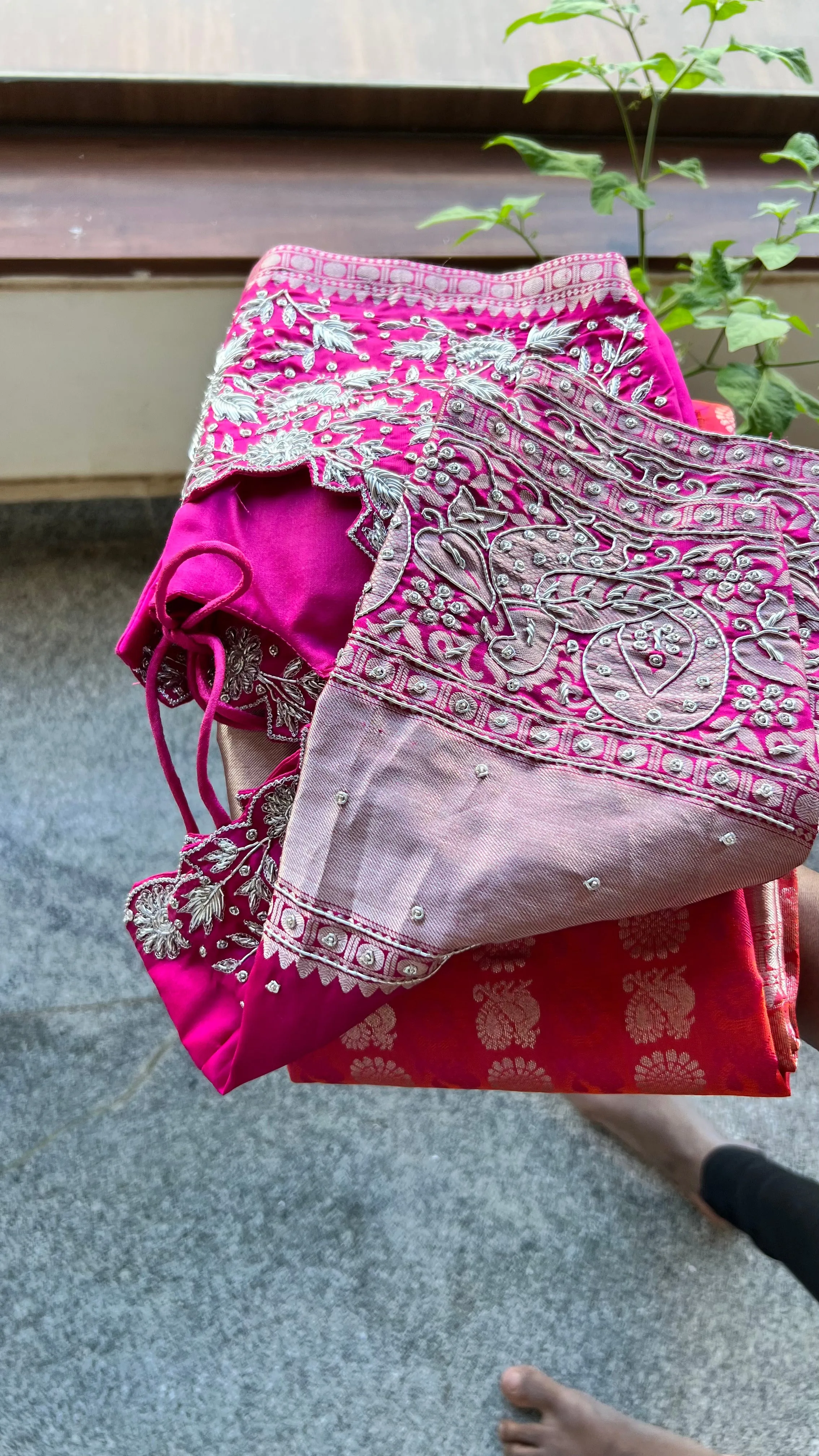 Red and silver kanchipuram silk saree with hand worked blouse